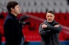 Monaco's head coach Niko Kovac is seen after his player Guillermo Maripan scores against PSG as PSG's head coach Mauricio Pochettino looks during the French League One soccer match between Paris Saint Germain and Monaco, at the Parc des Princes stadium, in Paris, France, Sunday, Feb. 21, 2021. (AP Photo/Francois Mori)