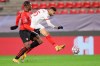 Sevilla's Youssef En-Nesyri, right, in action during the Champions League, group E soccer match between Rennes and Sevilla at the Roazhon Park stadium in Rennes, France, Tuesday, Dec. 8, 2020. (AP Photo/David Vincent)