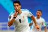 Uruguay's Luis Suarez celebrates after scoring from the penalty spot his side's second goal against Colombia during a qualifying soccer match for the FIFA World Cup Qatar 2022 at the Metropolitano stadium in Barranquilla, Colombia, Friday, Nov. 13, 2020. (AP Photo/Fernando Vergara)