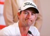 FILE - In this Nov. 27, 2013, file photo, Australia's Adam Scott addresses the media ahead of the Australian Open golf tournament in Sydney. In a phone-a-friend moment during the coronavirus pandemic, Adam Scott reached out to a fellow golfer who'd been waiting for his call. (AP Photo/Rick Rycroft, File)