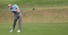 South Africa's Louis Oosthuizen plays his second shot on the 5th hole during the second round of the Australian Open golf tournament in Sydney, Friday, Dec. 6, 2019. (AP Photo/Rick Rycroft)