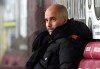 Manchester City's head coach Pep Guardiola looks on before the English Premier League soccer match between Burnley and Manchester City at Turf Moor stadium in Burnley, England, Wednesday, Feb. 3, 2021. (Martin Rickett/Pool via AP)