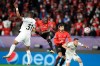 Rennes' Serhou Guirassy, centre, heads the ball during the Champions League, group E soccer match between Rennes and Krasnodar at the Roazhon Park stadium in Rennes, France, Tuesday, Oct. 20, 2020. (AP Photo/David Vincent)