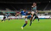 Brighton's Neal Maupay, left, duels for the ball with Newcastle's Andy Carroll during the English Premier League soccer match between Newcastle United and Brighton at St. James' Park in Newcastle, England, Sunday, Sept. 20, 2020. (Lee Smith/Pool via AP)
