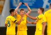 Ukraine's Olexandr Zinchenko, centre, celebrates with teammates after scoring his side's second goal during the UEFA Nations League soccer match between Ukraine and Switzerland at the Arena Lviv stadium in Lviv, Ukraine, Thursday, Sept. 3, 2020. (AP Photo/Efrem Lukatsky)