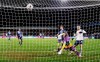 Tottenham's Gareth Bale, right, scores his side's opening goal during the English FA Cup 4th round soccer match between Wycombe Wanderers and Tottenham Hotspur at Adams Park stadium in High Wycombe, England, Monday, Jan. 25, 2021. (AP Photo/Frank Augstein)