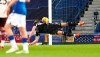 Arsenal's goalkeeper Bernd Leno dives but fails to save the goal from Everton's Yerry Mina during the English Premier League soccer match between Everton and Arsenal at Goodison Park in Liverpool, England, Saturday, Dec. 19, 2020. (AP Photo/Jon Super, Pool)