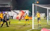 Wolverhampton Wanderers's goalkeeper John Ruddy makes a save during the Emirates FA Cup fourth round soccer match between Chorley and Wolverhampton Wanderers at Victory Park in Chorley, England, Friday, Jan. 22, 2021. (AP Photo/Jon Super)
