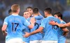 Manchester City's Phil Foden, centre, celebrates after scoring his side's opening goal during the English Premier League soccer match between Manchester City and Brighton and Hove Albion at the Etihad Stadium in Manchester, England, Wednesday, Jan. 13, 2021. (Laurence Griffiths, Pool via AP)