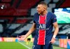 PSG's Kylian Mbappe reacts during the Champions League, second leg, quarterfinal soccer match between Paris Saint Germain and Bayern Munich at the Parc des Princes stadium, in Paris, France, Tuesday, April 13, 2021. (AP Photo/Francois Mori)