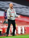Manchester City's head coach Pep Guardiola reacts during the English Premier League soccer match between Arsenal and Manchester City at the Emirates stadium in London, England, Sunday, Feb. 21, 2021. (John Walton/Pool via AP)