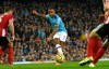 Manchester City's Raheem Sterling takes a shot during the English Premier League soccer match between Manchester City and Sheffield United at Etihad stadium in Manchester, England, Sunday, Dec. 29, 2019. (AP Photo/Rui Vieira)