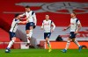 Tottenham's Erik Lamela, second left, celebrates after scoring his side's opening goal during the English Premier League soccer match between Arsenal and Tottenham Hotspur at the Emirates stadium in London, England, Sunday, March 14, 2021. (Dan Mullan/Pool via AP)