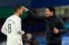 Arsenal manager Mikel Arteta gives instructions to Dani Ceballos, left, from the touchline during the English Premier League soccer match between Everton and Arsenal at Goodison Park in Liverpool, England, Saturday, Dec. 19, 2020. (AP Photo/Jon Super, Pool)