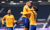 Everton's Richarlison, centre, celebrates after scoring his side's opening goal during the English Premier League soccer match between West Bromwich Albion and Everton at the Hawthorns, West Bromwich, England, Thursday, March 4, 2021. (Alex Pantling/Pool via AP)