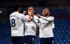 Manchester City's Raheem Sterling, right, celebrates with teammates after scoring his side's second goal during the English Premier League soccer match between Burnley and Manchester City at Turf Moor stadium in Burnley, England, Wednesday, Feb. 3, 2021. (Gareth Copley/Pool via AP)