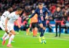 PSG's Kylian Mbappe controls the ball during the French League One soccer match between Paris-Saint-Germain and Dijon, at the Parc des Princes stadium in Paris, France, Saturday, Feb. 29, 2020. (AP Photo/Michel Euler)