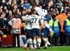 Tottenham players celebrate after Tottenham's Son Heung-min scored his side's third goal during the English Premier League soccer match between Aston Villa and Tottenham Hotspur at Villa Park in Birmingham, England, Sunday, Feb. 16, 2020. (AP Photo/Rui Vieira)