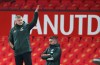 Manchester United's manager Ole Gunnar Solskjaer gives instructions from the side line during the English Premier League soccer match between Manchester United and Brighton and Hove Albion at Old Trafford, Manchester, England, Sunday, Apr. 4, 2021. (Clive Brunskill/Pool via AP)