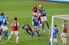 Brighton's Dan Burn heads the ball during the English Premier League soccer match between Burnley and Brighton at the Turf Moor stadium in Burnley, England, Sunday, July 26, 2020. (Nick Potts/PA via AP)