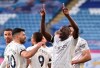 Manchester City's Benjamin Mendy, right, celebrates after scoring his side's opening goal during the English Premier League soccer match between Leicester City and Manchester City at the King Power Stadium in Leicester, England, Saturday, April 3, 2021. (AP Photo/Rui Vieira, Pool)