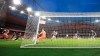 Arsenal's Hector Bellerin, left, scores his side's third goal during the English Premier League soccer match between Arsenal and Leeds United at the Emirates stadium in London, England, Sunday, Feb. 14, 2021. (Catherine Ivill/Pool via AP)