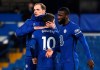 Chelsea's head coach Thomas Tuchel, left, Chelsea's Christian Pulisic, centre, and Chelsea's Antonio Rudiger react after the English Premier League soccer match between Chelsea and Manchester United at Stamford Bridge Stadium in London, England, Sunday, Feb. 28, 2021. (Andy Rain/Pool via AP)