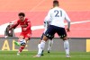 Liverpool's Trent Alexander-Arnold scores his side's second goal during the English Premier League soccer match between Liverpool and Aston Villa at Anfield stadium in Liverpool, England, Saturday, April 10, 2021. (Clive Brunskill/Pool via AP)