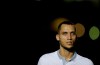 FILE - In this Jan. 25, 2017 file photo, Neto, a former Chapecoense soccer player who survived the teams deadly plane crash in 2016, stands on the field as he is honored prior to a friendly match between Brazil and Colombia at Nilton Santos stadium in Rio de Janeiro, Brazil. Neto announced his retirement from the sport on Friday, Dec. 13, 2019. The 34-year-old tried to recover for two years after the accident that killed 71 people in Colombia and returned to training in March. But in an interview he said his pains were too intense to play again. (AP Photo/Leo Correa, File)