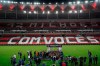 Soccer players of Flamengo celebrate with their trophy after winning the Rio de Janeiro state championship at the Maracana stadium, Rio de Janeiro, Brazil, Wednesday, July 15, 2020. The match was played without spectators to curb the spread of COVID-19.(AP Photo/Leo Correa)