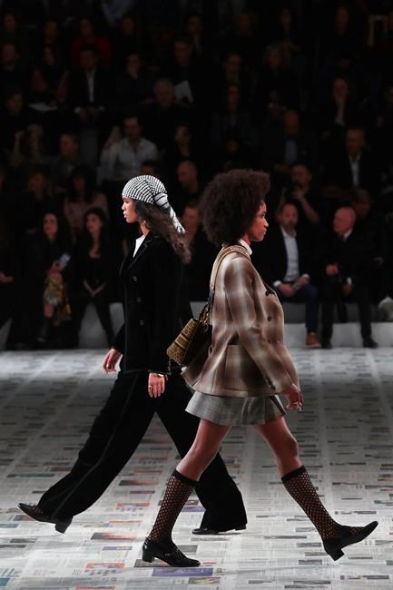 Models wear creations for the Dior fashion collection during Women's fashion week Fall/Winter 2020/21 presented in Paris, Tuesday, Feb. 25, 2020. (AP Photo/Thibault Camus)