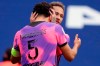 PSG's Marquinhos celebrates with teammate Neymar after scoring his side's second goal during the French League One soccer match between Paris Saint-Germain and Lens at the Parc des Princes stadium in Paris, France, Saturday, May 1, 2021. (AP Photo/Thibault Camus)