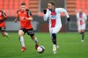 PSG's Neymar, right, challenges for the ball with Lorient's Jonathan Delaplace, during the French League One soccer match between FC Lorient and Paris Saint-Germain at the Moustoir stadium in Lorient, western France, Sunday, Jan. 31, 2021. (AP Photo/David Vincent)