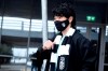 Japanese soccer player Shinji Kagawa gestures, upon his arrival at the airport in the northern city of Thessaloniki, Greece, Tuesday, Jan. 26, 2021. Former Manchester United and Borussia Dortmund midfielder Shinji Kagawa has moved to PAOK based in the northern Greek city of Thessaloniki, the soccer club announced on Wednesday, Jan. 27, 2021. (AP Photo/Giannis Papanikos)