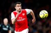 FILE- In this Thursday, Dec. 5, 2019 file photo, Arsenal's Sokratis Papastathopoulos eyes the ball during the English Premier League soccer match between Arsenal and Brighton, at the Emirates Stadium in London. Greece and former Arsenal defender Sokratis Papastathopoulos has signed for Greek champion Olympiakos on Monday, Jan 25, 2021, in a deal worth a reported 1.2 million euros ($1.46). (AP Photo/Frank Augstein)