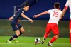 PSG's Angel Di Maria, left, controls the ball as Nimes' Andres Cubas defends during the French League One soccer match between Paris Saint-Germain and Nimes at the Parc des Princes stadium in Paris, France, Wednesday, Feb. 3, 2021. (AP Photo/Michel Euler)