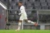 PSG's Kylian Mbappe celebrates after scoring his side's third goal during the Champions League quarterfinal soccer match between Bayern Munich and Paris Saint Germain in Munich, Germany, Wednesday, April 7, 2021. (AP Photo/Matthias Schrader)