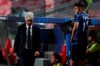 Atalanta's head coach Gian Piero Gasperini, left, reacts during the Champions League quarter-final soccer match between Atalanta and Paris Saint-Germain, at the Luz stadium in Lisbon, Portugal, Wednesday, Aug. 12, 2020. PSG won 2-1. (Rafael Marchante/Pool via AP)