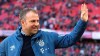 Bayern's interim head coach Hans-Dieter Flick arrives before the German Bundesliga soccer match between FC Bayern Munich and FC Augsburg in Munich, Germany, Sunday, March 8, 2020. (AP Photo/Matthias Schrader)