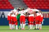 Leipzig's players huddle before the Champions League round of 16, first leg, soccer match between RB Leipzig and Liverpool at the Ferenc Puskas stadium in Budapest, Hungary, Tuesday, Feb. 16, 2021. (AP Photo/Laszlo Balogh)
