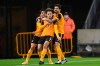 Wolverhampton Wanderers' Rayan Ait-Nouri, center, celebrates after scoring his side's first goal during the English Premier League soccer match between Wolverhampton Wanderers and Crystal Palace at the Molineux Stadium in Wolverhampton, England, Friday, Oct, 30, 2020. (Michael Regan/Pool via AP)
