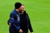 Bayern's head coach Hans-Dieter Flick walks with Bayern's Javi Martinez ahead of the German Bundesliga soccer match between Bayern Munich and Bayer Leverkusen at the Allianz Arena stadium in Munich, Germany, Tuesday, April 20, 2021. (Christof Stache, Pool via AP)