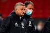 Manchester United's manager Ole Gunnar Solskjaer leaves at the end of the first half during the Europa League, quarterfinal, second leg soccer match between Manchester United and Granada at the Old Trafford stadium, in Manchester, Thursday, April 15, 2021. (AP Photo/Dave Thompson)