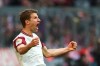 Bayern's Thomas Mueller celebrates after scoring his side's first goal during the German Bundesliga soccer match between FC Bayern Munich and FC Augsburg in Munich, Germany, Sunday, March 8, 2020. (AP Photo/Matthias Schrader)
