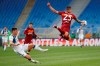 Atalanta's Ruslan Malinovskyi, left, challenges for the ball with Roma's Gianluca Mancini during the Italian Serie A soccer match between Roma and Atalanta at Rome's Olympic stadium, Italy, Thursday, April 22, 2021. (AP Photo/Alessandra Tarantino)