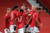 Manchester United's Scott McTominay celebrates after scoring his side's first goal during the English FA Cup 5th round soccer match between Manchester United and West Ham United at Old Trafford in Manchester, England, Tuesday, Feb. 9, 2021. (Martin Rickett/Pool via AP)