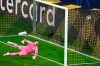 Manchester City's goalkeeper Ederson fails to save a shot by Dortmund's Jude Bellingham during the Champions League quarterfinal second leg soccer match between Borussia Dortmund and Manchester City at the Signal Iduna Park stadium in Dortmund, Germany, Wednesday, April 14, 2021. (Federico Gambarini/Pool via AP)