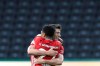 Bayern's Robert Lewandowski, right, celebrates after scoring his side's third goal with teammate Serge Gnabry during the German soccer cup (DFB Pokal) final match between Bayer 04 Leverkusen and FC Bayern Munich in Berlin, Germany, Saturday, July 4, 2020. (AP Photo/Michael Sohn)