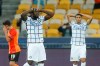 Inter Milan's Romelu Lukaku, left, reacts after missing an opportunity to score during the Champions League, Group B, soccer match between Shakhtar Donetsk and Inter Milan at the Olimpiyskiy Stadium in Kyiv, Ukraine, Tuesday, Oct. 27, 2020.(AP Photo/Efrem Lukatsky)