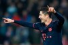 Bayern's Robert Lewandowski celebrates after scoring his side's third goal from the penalty spot during the Champions League group B soccer match between Red Star and FC Bayern Munich at the Rajko Mitic Stadium, in Belgrade, Serbia, Tuesday, Nov. 26. (AP Photo/Darko Vojinovic)